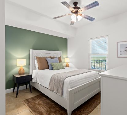 [Bedroom #2] Queen with ceiling fan, smart Tv, and access door to guest bath