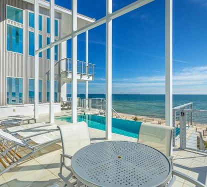 This luxurious pool deck has room and seating for your entire group
