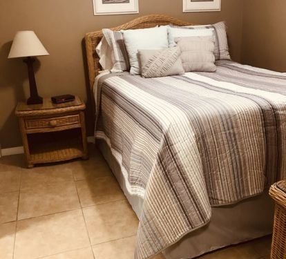 Queen bedroom with flat screen television