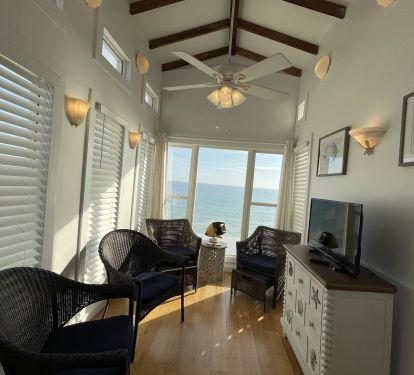 Master Bedroom Sitting Area. All new furniture with chest and TV
