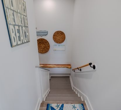Stairs from the main entryway to the main living area