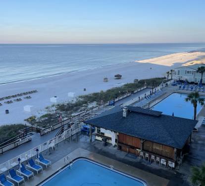 Sunrise - West View off Balcony - 2 Olympic pools (heated) + Tiki Bar