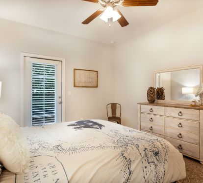 Downstairs queen bedroom with access to the back deck