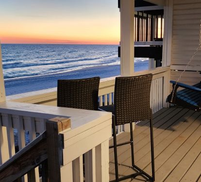 Ground level balcony, polywood swing ,stairs to the beach level
