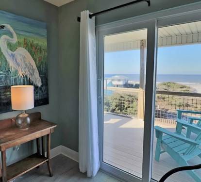 upstairs master 2 with covered ocean view balcony