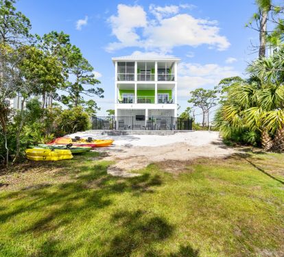 Belle from the bay side. Pool area, kayaks and room to enjoy!