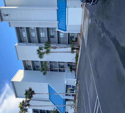 Parking view of building street side 