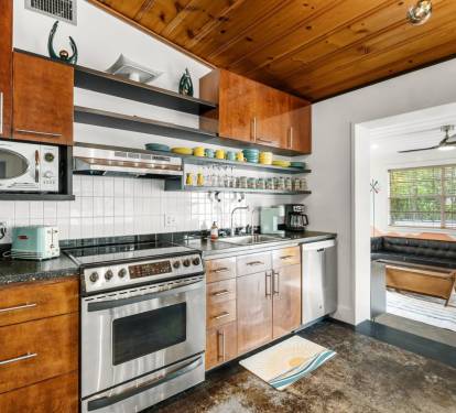 Kitchen Open to Game Room