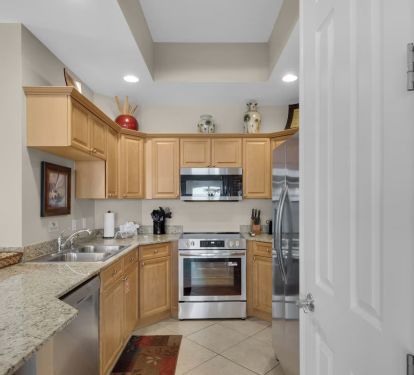 Kitchen with solid surface counters and new appliances!