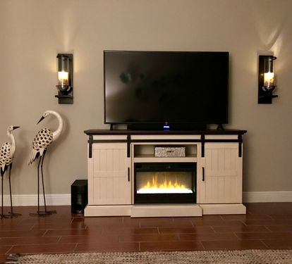 60 inch HD TV and yes, that is a fireplace!