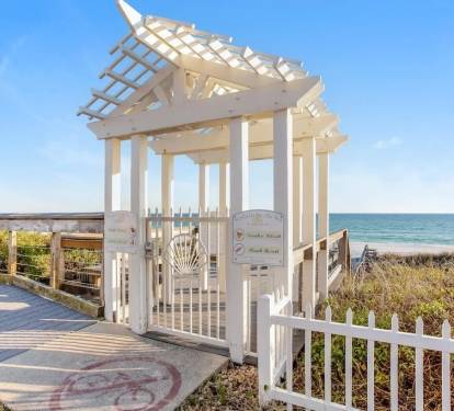 Private access to 320' of deeded beach with complimentary beach service