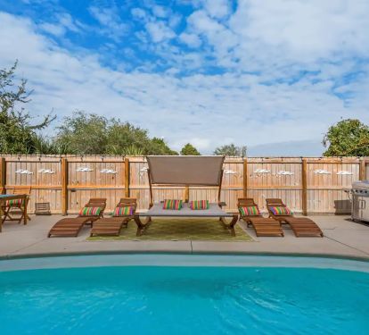 Freestyle-3 Ready to take a break from the waves? Cool off in Freestyle's full sized pool with fenced grilling and outdoor dining area.