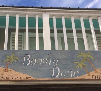 Bonnie Dune - the sign. There's some more of that teal color on the soffits.