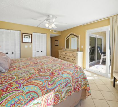 Master bedroom with double closet &amp; balcony access