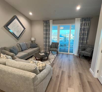 Living space with balcony and dining table