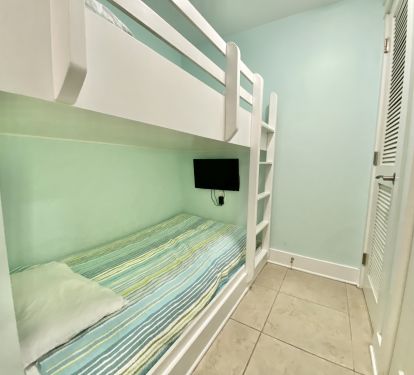 Twin bunk beds. TV is dvd only.
