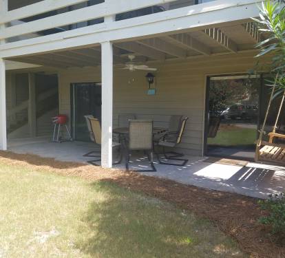 patio table and swing with ceiling fan