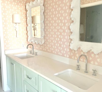Master bathroom features his and hers sinks and large walk in closet.