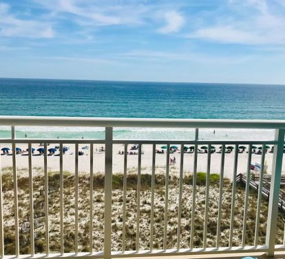 view of beach from balcony &amp; living room - look down view of the pools hot tub