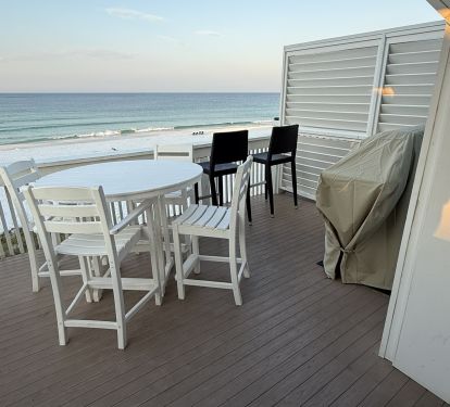 Private balcony off living area, polywood table &amp; chairs, gas grill