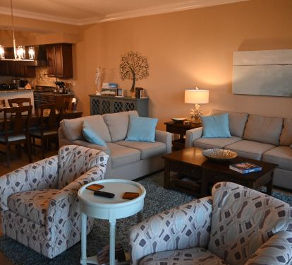 Comfortable Casual Living Room Decorated In Pastel Beachy Colors.