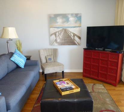 Family room w/comfy sofa bed &amp; 58 in. Smart TV