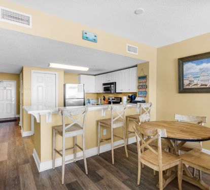 Eat at the bar, dining table or in the living area in front of the TV