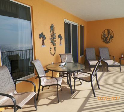 ENJOY DINING AND RELAXATION ON THE HUGE PATIO OVERLOOKING THE GULF OF MEXICO