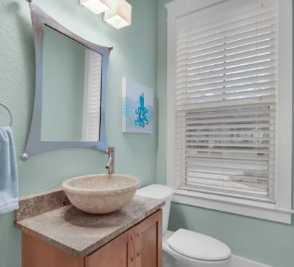 Shenanigans-9 1st floor powder room with granite vanity.