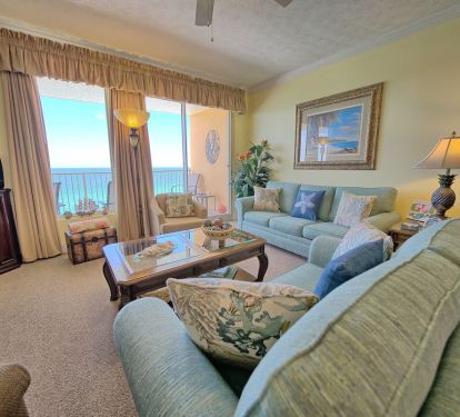 STEP OUT OUT OF THE LIVING AREA ONTO THE HUGE PATIO OVERLOOKING THE GULF .