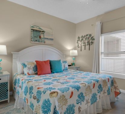 Guest Bedroom features a king bed, smart TV and attached bathroom