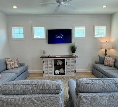 Grand living room arrangement for enjoying movie time as family