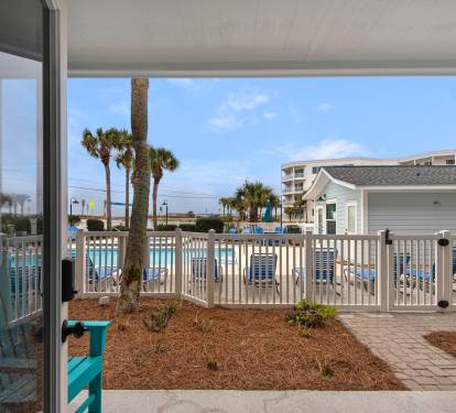 Great patio with entrance to pool