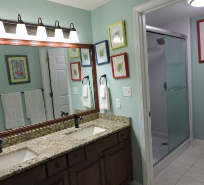 Primary en suite bathroom with beautiful walk in shower!