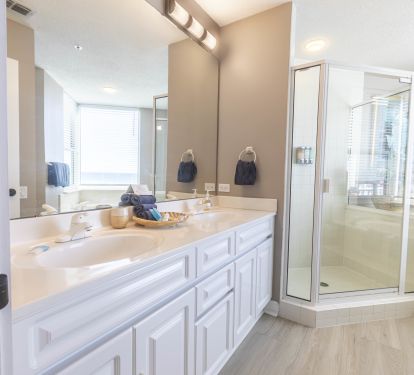 Master bedroom ensuite with double vanities, walk-in shower and jacuzzi