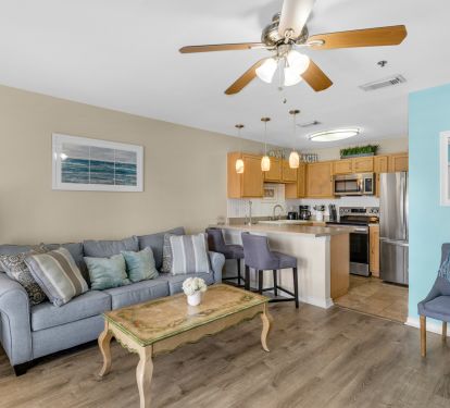 Kitchen with view of open living area