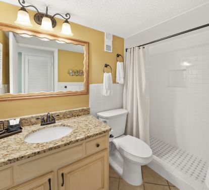 Tile walk in shower / hall bath.