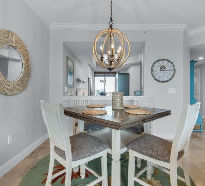 Dine with a view through to the kitchen, gulf balcony and northside balcony