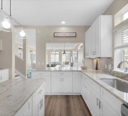 Sunkissed-11 open kitchen concept allows the family chef to take part in the conversations during meal prep time.
