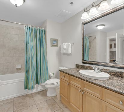 Full bathroom with tub and shower combo
