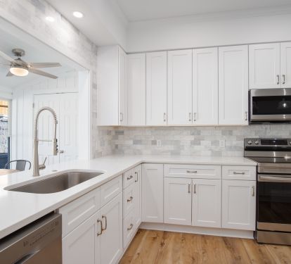 All new stainless steel appliances and farmhouse sink.