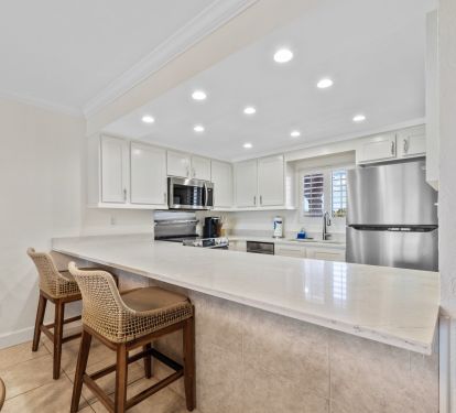 Extra seating at the kitchen counter.
