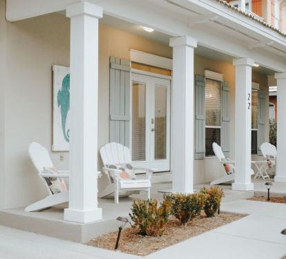 Large porch welcomes you to Sea Fan Cottage 