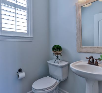 Powder room off of living and dining areas