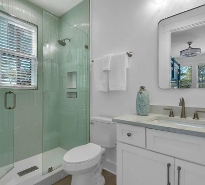 Whimsy-23 Bedroom 3 Bath. Pic 1. Bunkroom with attached bath with quartz vanity and frameless glass shower