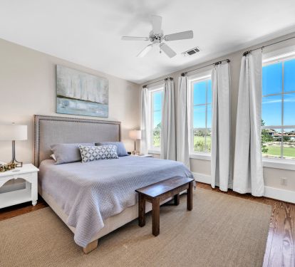 Upstairs primary king bedroom with walk in closet, private bath