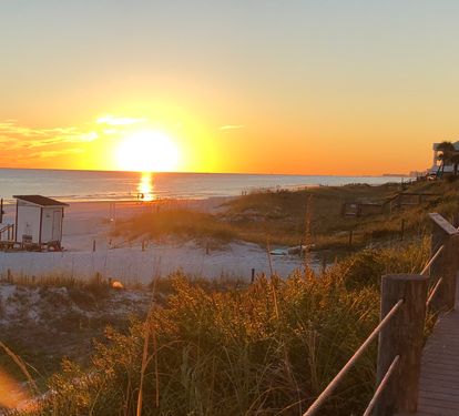 Endless sunsets from your private beachfront deck