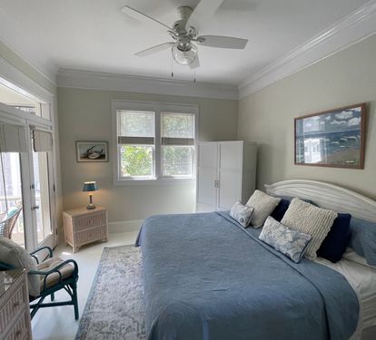 Downstairs Family Suite- Master Bedroom with doors to the back porch