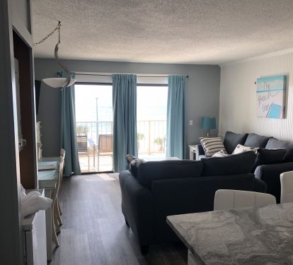 Living room with view from kitchen.