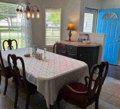 Large oak dining room table with extra leaves seats 12 people